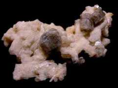 coromotominerals.com Albites