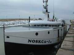 Noskcaj